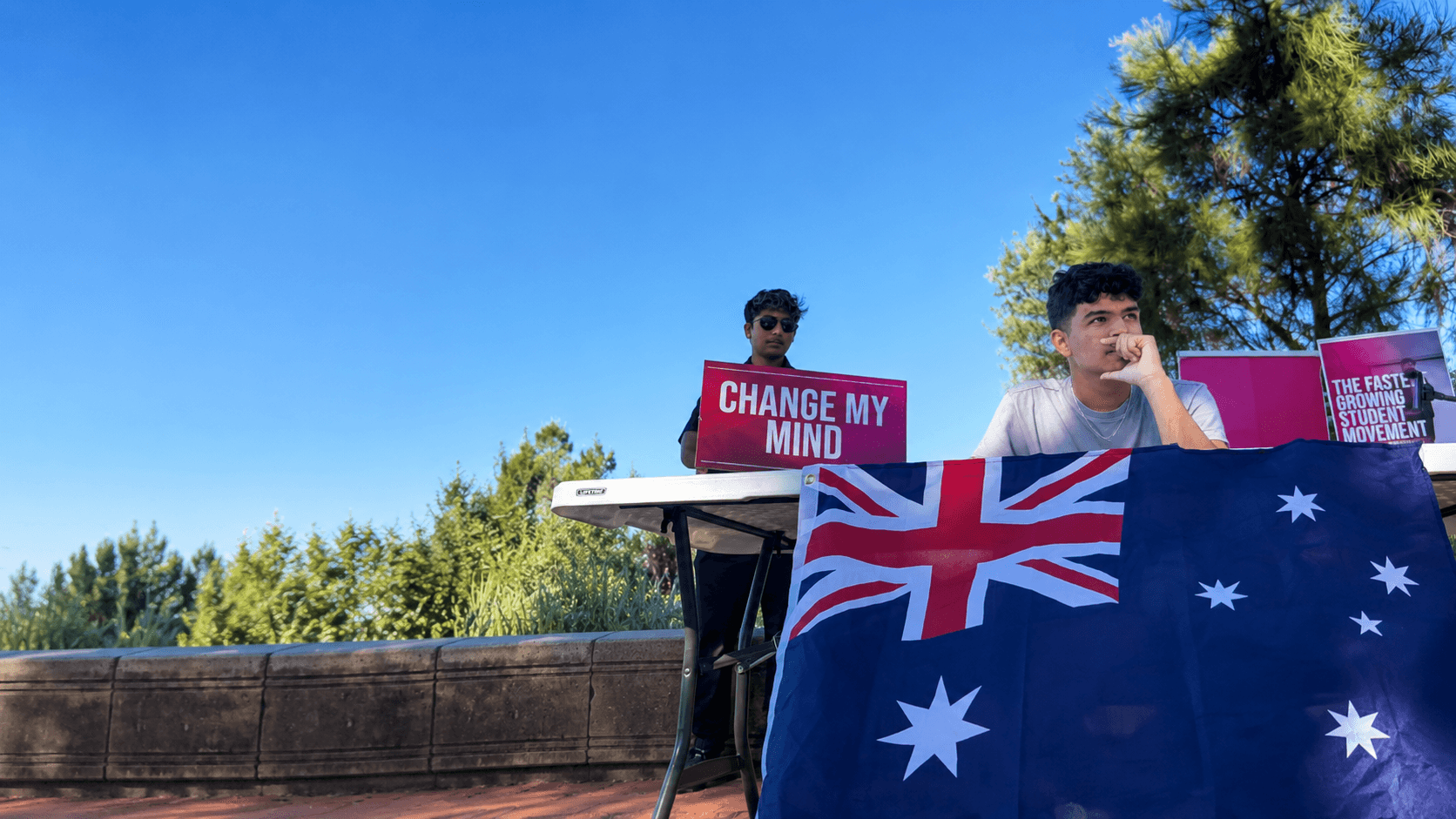 Young Australians exchanging ideas at a community event